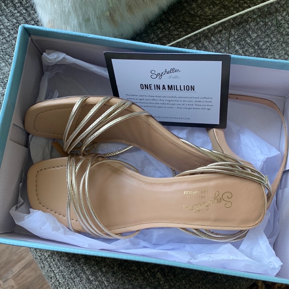 New with box! Never worn Seychelles gold heeled sandals.